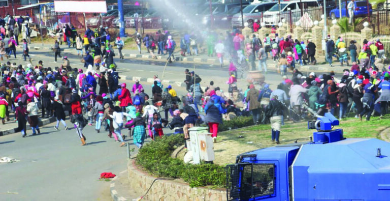 Police barred from harassing striking workers