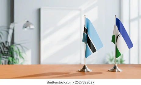 flags-botswana-lesotho-on-table-260nw-2527322027