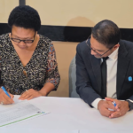 The President of UNICEF, Deepak Dhaskharan and the Princial Secretary of the Ministry of Finance and Development Planning, Nthoateng Lebona.