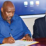 Principal Secretary Kanono Ramashamole  and  Representative Deepak Bhaskaran.