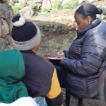 Regional Monitoring and Evaluation Officer for REPSSI Lwandle Khanyile conducting interviews with members of the support group in Thaba-Tseka Ha Matsumunyane. (1)
