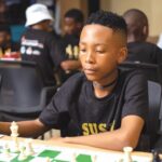 Thato Moorosi concentrates during a match at the Susan@50 Chess Championship. Moorosi dominated his section, scoring five out of seven points to claim first place
